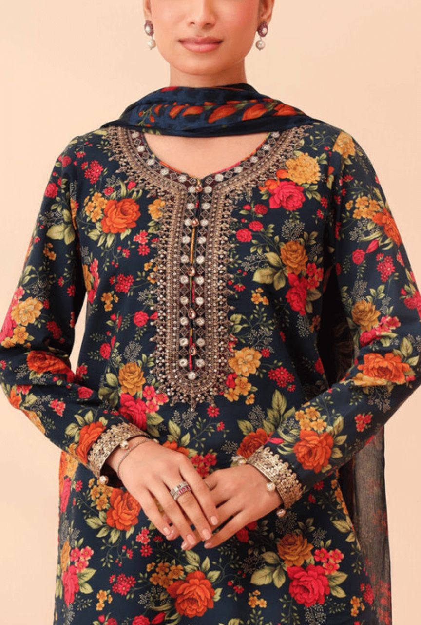 Woman wearing a floral embroidered traditional outfit with a beige background