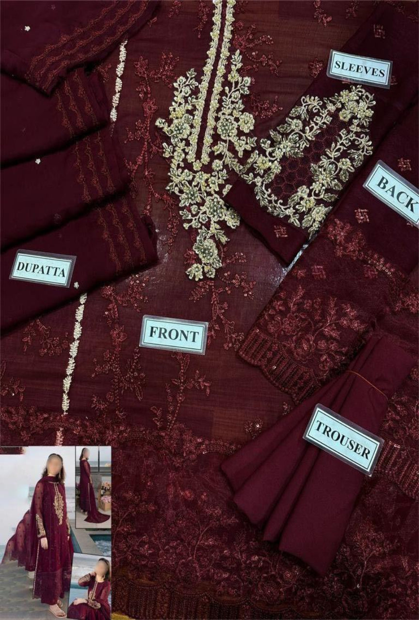 Maroon embroidered outfit with labels indicating parts of the garment.