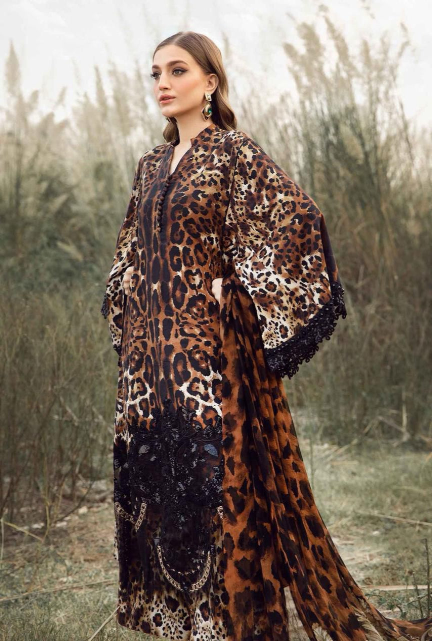 Woman wearing a leopard print dress in a natural setting