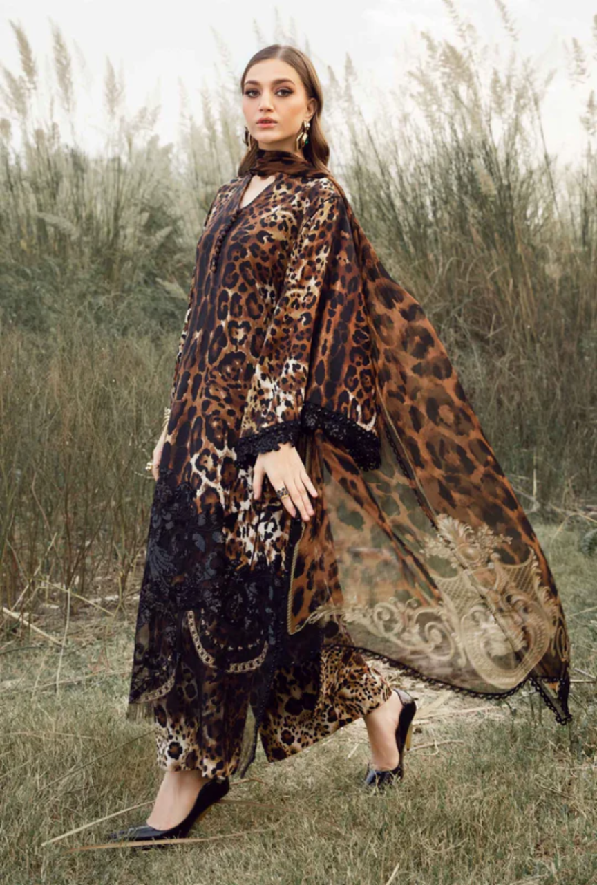 Woman wearing a leopard print scarf in a natural setting