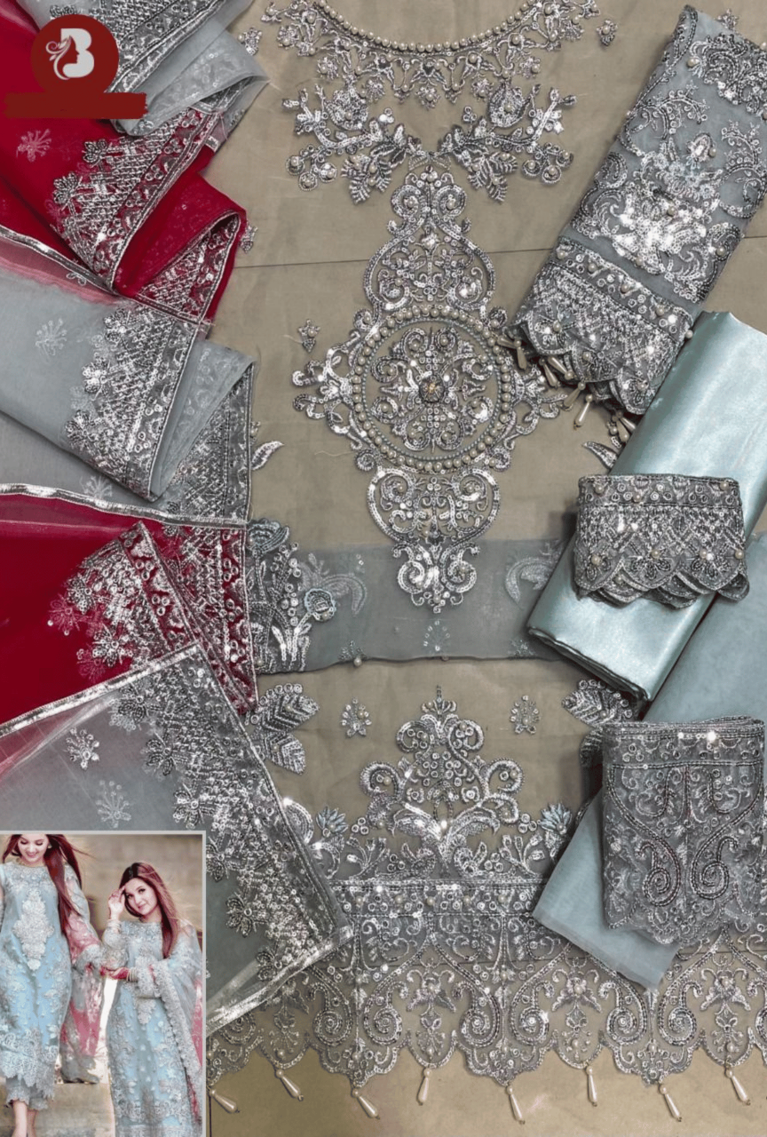 Decorative silver lace fabric with intricate patterns on a beige background, featuring a small inset of two women wearing similar outfits.
