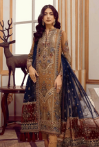 Woman wearing a traditional embroidered outfit with a deer statue in the background