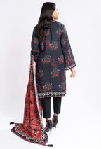 Woman wearing a black and red embroidered outfit with a matching dupatta on a white background