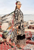 Woman in a patterned outfit standing on a rooftop with cityscape in the background
