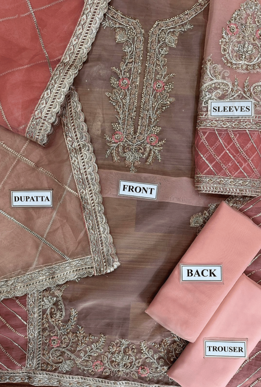 Brown embroidered outfit with labels indicating parts of the garment.